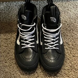 Vans Black and White High-Top Sneakers